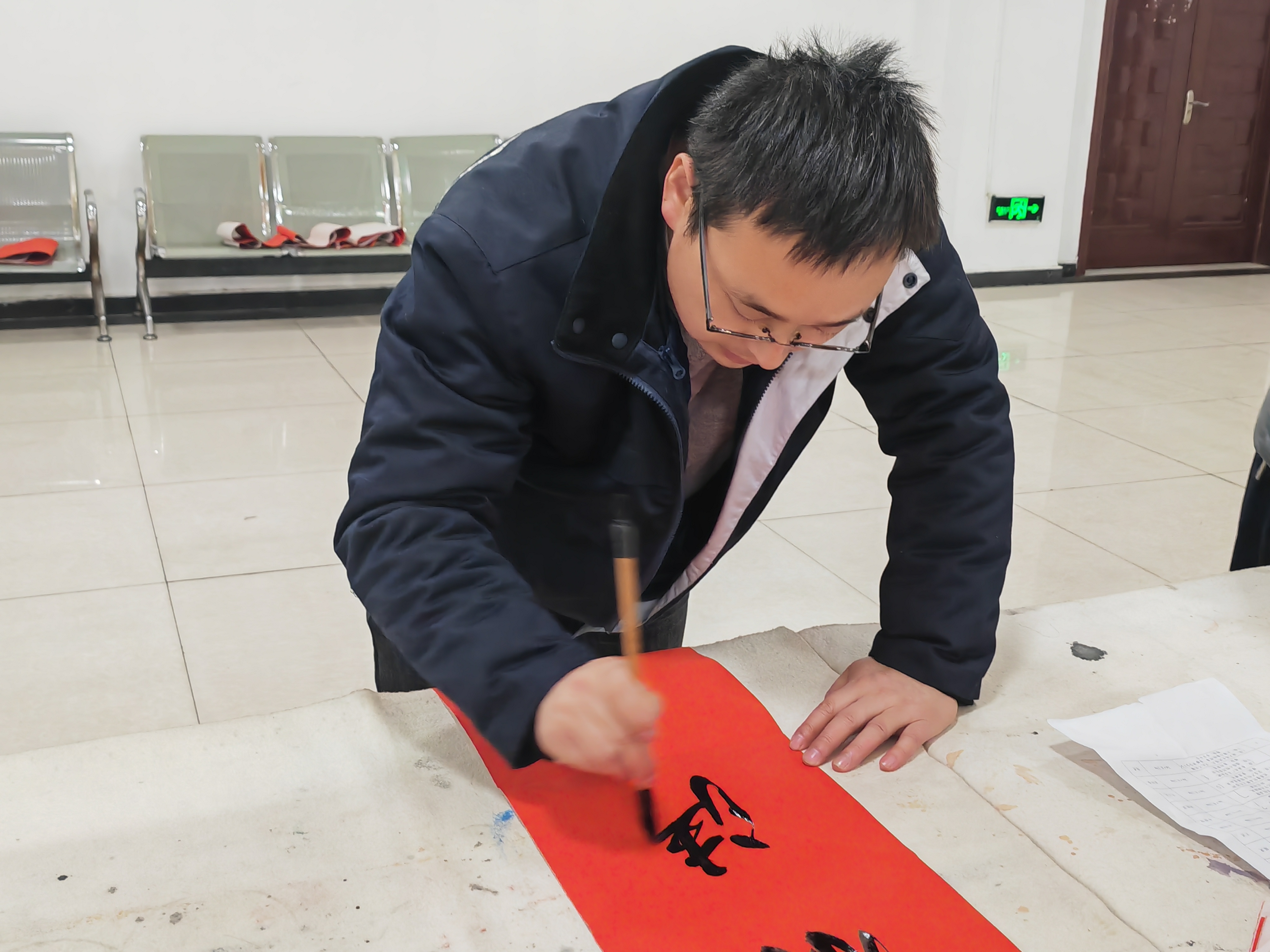 金毫蘸福書新歲，丹墨凝祥寫錦程！ 漢鋼公司舉辦第十二屆義務(wù)寫春聯(lián)活動(dòng)